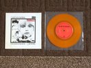 U2 Three Limited Edition Orange 7 Inch Irish Vinyl Single.