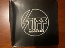 STIFF RECORDS SINGLES BOX - 1st edition: insert, records mint, box 45 years old