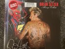 signed the devil always collects (red vinyl) - autographed by brian setzer