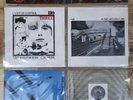 Vintage U2 '4 U2 Play' 4 vinyl singles in plastic wall hanger. Sunburst Label.