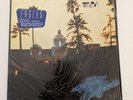 The Eagles - Hotel California - Shrink/Stickers - Asylum 7E1084 - NM/NM