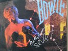 David Bowie Let's Dance Album signed by lead guitarist Stevie Ray Vaughan