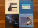 Vinyl Record 4 Pack - Dire Straits, Communique, Brothers in Arms, Love Over Gold