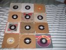 12 Vintage Elvis Presley 45 RPM Singles In Paper Sleeves and Plastic Sleeves Lot