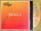 JUNGLE – VOLCANO HAND SIGNED VINYL LP  ORANGE SPLATTER AUTOGRAPHED WİTH LYRICS