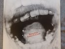 Biting Off The Tongue Of A Corpse. Giorno Poetry Systems Records. 1975.GPS 005.