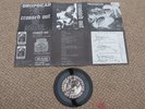 Dropdead / Crossed Out – New World Slaughter / Supremacy, 5