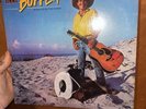 Jimmy Buffett Riddles In The Sand LP. MCA Records. MCA-5512. 1984.