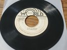 DR ALIMANTADO A BIT OF BREAD / VERSION JAMAICAN BLACK WORLD 7
