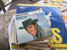 Elvis records 1 album and 11 45’s
