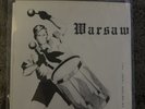WARSAW/JOY DIVISION -THE IDEAL BEGINNING- 7” Inch EP, UK ENGIMA NM/NM