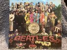 The Beatles St Pepper Lonely hearts Club Band.