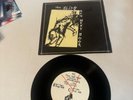 THE SLITS MAN NEXT DOOR 7