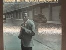 Miles Davis on Prestige 7166.