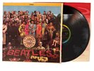 BEATLES Sgt Pepper’s... CAPITOL Vinyl LP VG/VG+ rainbow w/ cutout Insert