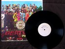 Beatles LP Odd Sgt. Pepper U.S. Reissue, EX Vinyl