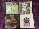 4 x Rod Stewart original vinyl albums. An old raincoat, Sing it again Rod …..