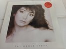 KATE BUSH THE WHOLE STORY BLUE COLOURED VINYL LP KBTV1 EX/EX FREE UK P+P - LOOK