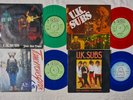 UK SUBS SINGLES X 4 TOMOROW GIRL STRANGLEHOLD SHES NOT THERE COLOUR VINYL