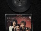 QUEEN “Radio Ga Ga/I Go Crazy” Signed 7” FREDDIE MERCURY BRIAN MAY TAYLOR DEACON
