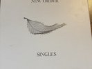 New Order Singles vinyl 4 LP ( Pre-owned) Never Played. Limited Box Set