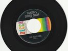 SURFARIS 45 rpm record--SANTA'S SPEED SHOP