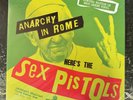 Sex Pistols Anarchy in Rome.  Limited edition “snot green” vinyl, still sealed.