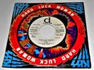 KISS     ---  hard luck woman    ---   hole cover promo