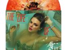 Taylor Swift THE LIFE OF A SHOWGIRL: LIT MY SKY UP ORANGE METALLIC VINYL IN HAND