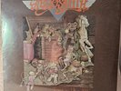 Aerosmith Toys In The Attic Unopened 1975, Includes Black Matte Hanging Frame