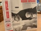Mission: Impossible (Music from the Motion Picture Score) by Danny Elfman. BLACK