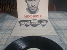The The MIND BOMB LP Epic 463319 1 1989 UK Textured Sleeve. VG+